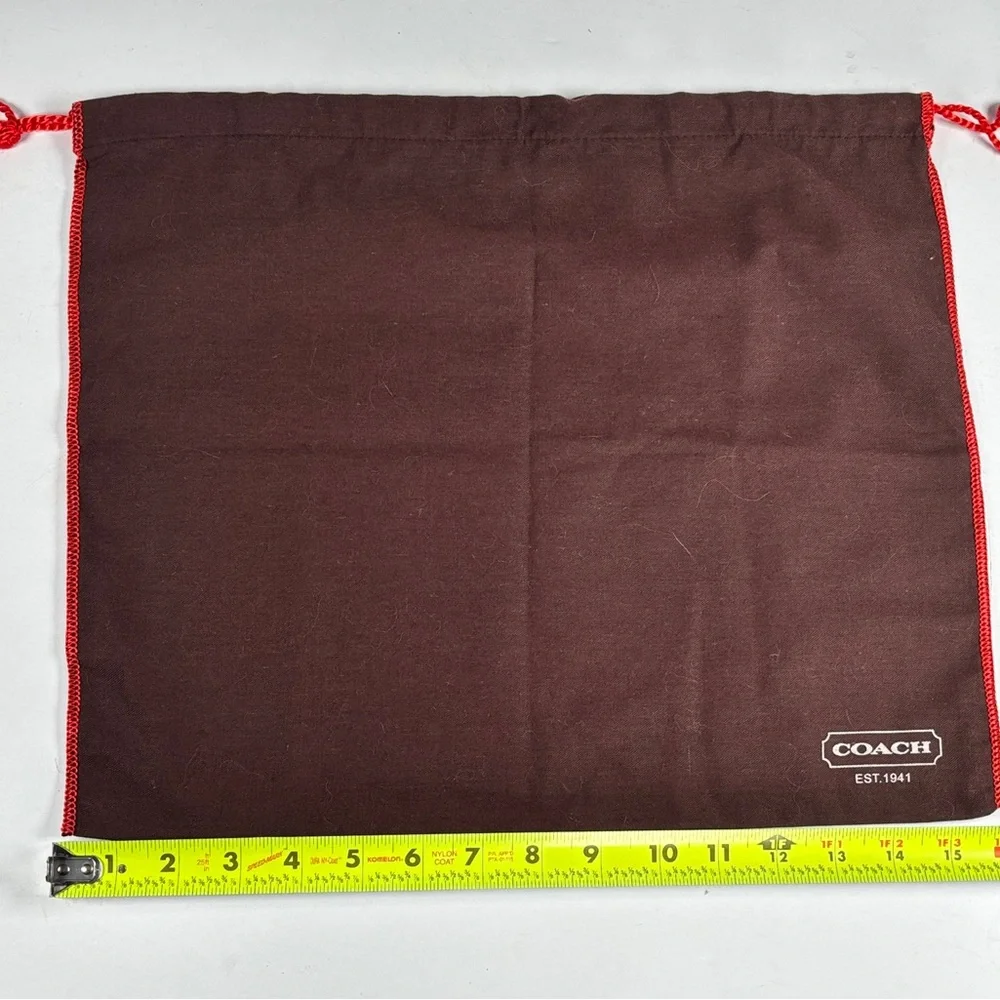 Coach Dark Brown Drawstring Bag with Red Accents. NWOT